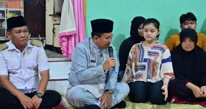 
					Mengapa Ahli Waris Ketua RT di Jambi Bisa Menerima Rp156 Juta? Ini Penjelasannya